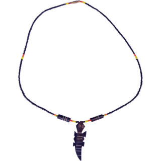 A BLACK BEADED NECKLACE WITH A COW-BONE CROCODILE SHAPED PENDANT